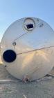 Used Stainless Steel Tank.  Approximately 7,000 gallon; 9' diameter x 15' straight side; Vetical; Slight coned top and bottom; Approximately 4