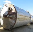 Used- Tate Metal Works 15,200 Gallon Stainless Steel Storage Tank. Approximately 12' diameter x 18' T/T. Flat bottom and con...