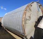 Used- Tate Metal Works 15,200 Gallon Stainless Steel Storage Tank. Approximately 12' diameter x 18' T/T. Flat bottom and con...