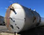 Used- Tate Metal Works 15,200 Gallon Stainless Steel Storage Tank. Approximately 12' diameter x 18' T/T. Flat bottom and con...