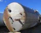 Used Tate Metal Works 15,200 Gallon Stainless Steel Storage Tank. Approximately 12' diameter x 18' T/T. Flat bottom and cone top.