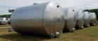 Used- 15,000 Gallon 304 Stainless Steel Agitated Tank. Dish Bottom and Top. Top manway. Equipped with Alsop Model 200- Explo...