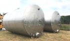 Used- 15,000 Gallon 304 Stainless Steel Agitated Tank. Dish Bottom and Top. Top manway. Equipped with Alsop Model 200- Explo...