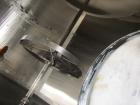 Used Tank, 10,000 Gallons, Stainless Steel.  Unit is jacketed on bottom and is insulated. Tank measures 116