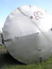 Used- 13,000 Gallon Capacity, Vertical Tank, Stainless Steel Construction. Measures 12' 4” diameter x 15' straight side. Fla...