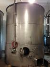Used Ripley Wine Fermentation Tank. 6,800 gallon capacity (26,000 liter). All 304 stainless steel construction. Measures 10' diameter x 12' high side wall. Sloped bottom, 3