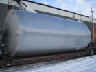 Used-15,000 Gallon Stainless Steel Tank, approximately 10'6" diameter x 23' straight side, slight cone top, flat bottom.