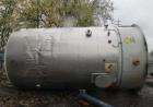 Used- 12,000 Gallon, 304 Stainless Steel Tank. 12' diameter x 16' straight side; 4' carbon steel skirt. Dished ends, 24