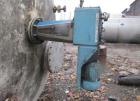 Used 12,000 Gallon, 304 Stainless Steel Tank. 12' diameter x 16' straight side; 4' carbon steel skirt. Dished ends, 24