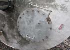 Used 12,000 Gallon, 304 Stainless Steel Tank. 12' diameter x 16' straight side; 4' carbon steel skirt. Dished ends, 24