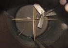 Used 12,000 Gallon, 304 Stainless Steel Tank. 12' diameter x 16' straight side; 4' carbon steel skirt. Dished ends, 24