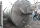 Used- 12,000 Gallon Stainless Steel Tank. 12' diameter x 16' straight side. 4' carbon steel skirt; dished ends. 24