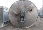 Used- 12,000 Gallon Stainless Steel Tank. 12' diameter x 16' straight side. 4' carbon steel skirt; dished ends. 24