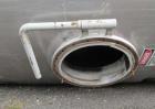Used- 12,000 Gallon Stainless Steel Tank. 12' diameter x 16' straight side. 4' carbon steel skirt; dished ends. 24