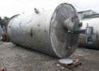 Used- 12,000 Gallon 304 Stainless Steel Tank. 12' diameter x 16' straight side. 4' carbon steel skirt, dished ends, 24