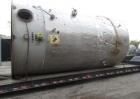 Used- 12,000 Gallon Stainless Steel Tank. 12' diameter x 16' straight side. 4' carbon steel skirt, dished ends, 24" side bot...