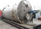 Used- 12,000 Gallon Stainless Steel Tank. 12' diameter x 16' straight side. 4' carbon steel skirt, dished ends, 24