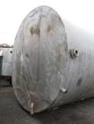 Used- 10,000 Gallon Stainless Steel Tank. Approximate 137" diameter x 161" straight side, flat top and bottom. 30" side bott...