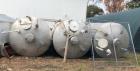 Used- Approximately 5000 Gallon Vertical Stainless Steel Storage Tank