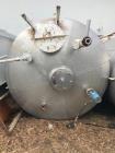 Used- Approximately 5000 Gallon Vertical Stainless Steel Storage Tank