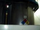 Used- Mueller, Approximately 8,000 Gallon 316L Stainless Steel Vertical Storage Tank. 11 diameter x 109