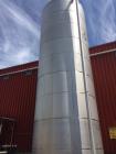 Used- Approximately 30,000 Gallon Stainless Steel Vertical Tank