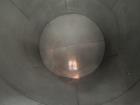 Used-Approximately 8000 Gallon Vertical Stainless Steel Tank