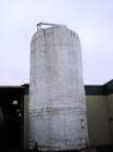 Used-20,000 Gallon Stainless Steel Storage Tank. Flat top and bottom, side discharge. Approximately 12' in diameter x 25' ov...