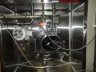Used 20,000 Gallon Jacketed Silo, mild steel exterior and stainless steel interior. Jacket coils are located in the bottom 1/3 of the tank. 7 1/2 hp, 240/480V, 60 hz. Agitator mounted at bottom side ...