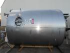 Used 5000 Gallon Jacketed SFI Stainless Steel Storage Tank. 10' diameter, 11 1/2' straight wall. Top agitated with 5 hp 3/60/240/480V motor, 1680 RPM.