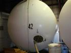 Used- 5,000 Gallon Mild Steel Exterior/Stainless Steel Tank. Interior previously used to store sweeteners. End manway, sight...