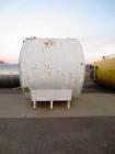 Used 5,000 Gallon Mild Steel Exterior/Stainless Steel Tank. Interior previously used to store sweeteners. End manway, sight glass. Overall Dims- 10'3