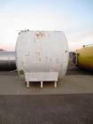 Used- 5,000 Gallon Mild Steel Exterior/Stainless Steel Tank. Interior previously used to store sweeteners. End manway, sight...