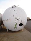 Used 5,000 Gallon Mild Steel Exterior/Stainless Steel Tank. Interior previously used to store sweeteners. End manway, sight glass. Overall Dims- 10'3