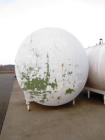 Used- 5,000 Gallon Mild Steel Exterior/Stainless Steel Tank. Interior previously used to store sweeteners. End manway, sight...