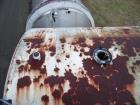 Used 5,000 Gallon Mild Steel Exterior/Stainless Steel Tank. Interior previously used to store sweeteners. End manway, sight glass. Overall Dims- 10'3