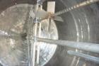 Used 7,200 Gallon Stainless Steel Scrape Agitation Tank. Jacketed, 316L stainless steel, vertical. 10' inside diameter x 11'9''. 18' high, 24'' cone bottom. 3'' tri clamp discharge. Two zone dimple j...
