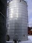 Used: Hammond Iron Works Tank, 15,000 gallon, 316 stainless steel, 11' diameter x 21' high, vertical.  Cone top and flat bottom. Insulated.  This tank has an API rating for outside storage.  MFRS. A....