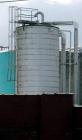 Used: Hammond Iron Works Tank, 15,000 gallon, 316 stainless steel, 11' diameter x 21' high, vertical.  Cone top and flat bottom. Insulated.  This tank has an API rating for outside storage.  MFRS. A....