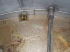 Used: Hammond Iron Works Tank, 15,000 gallon, 316 stainless steel, 11' diameter x 21' high, vertical.  Cone top and flat bottom. Insulated.  This tank has an API rating for outside storage.  MFRS. A....
