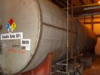 Used-12,000 Gallon Stainless Steel Horizontal Tank, approximately 9' x 32'.