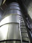 Used- Westeel 17,196 Gallon (65,000 Liter) 304 Stainless Steel Storage Tank. Vertical Design. Approx. 10' Diameter x 31'6