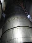 Used: Westeel 25,608 Gallon (96,800 Liter) 304 stainless steel storage tank. Vertical design. Approx. 12' diameter x 31'6