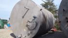 Used Tank, Approximate 10,000 Gallon, 304 Stainless Steel, Vertical. Approximate 132” diameter x 180” straight side. Flat welded top, flat bottom. 24” Man way with cover (4)3”, 3”, off center bottom ...