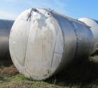 Used Saracco Tank & Mfg Approximately 5,200 Gallon Stainless Steel Storage Tank. Approximately 9' diameter x 11' straight side. Flat bottom and slight cone top. Various top openings including a 17