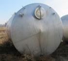 Used Saracco Tank & Mfg Approximately 5,200 Gallon Stainless Steel Storage Tank. Approximately 9' diameter x 11' straight side. Flat bottom and slight cone top. Various top openings including a 17