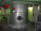 Used Krenz Approximately 5,200 Gallon Stainless Steel Storage Tank. Approximately 9' diameter x 11' straight side. Flat bottom and slight cone top. Various top openings including a 17