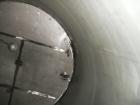 Used Krenz Approximately 5,200 Gallon Stainless Steel Storage Tank. Approximately 9' diameter x 11' straight side. Flat bottom and slight cone top. Various top openings including a 17