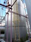 Used Alonso & Carus 25,000 Gallon Stainless Steel Vertical Storage Tank. 13'6