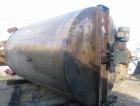 Used Tank, 6200 Gallon, 304 Stainless Steel, Vertical. 108” Diameter x 156” straight side, flat top, coned bottom. Top entering agitator with a shaft and (2) (6) blade turbines, driven by a 7.5hp mot...